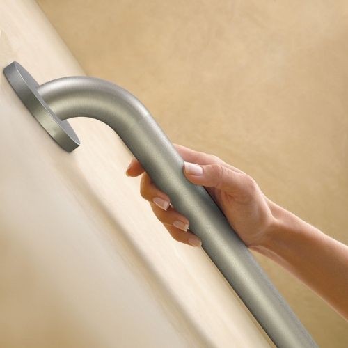 Peened Grab Bar On Wall Image of the Peened Grab Bar on the wall with hand using it.