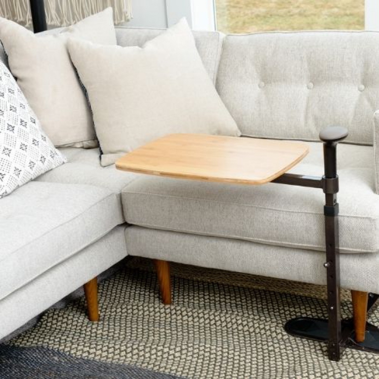 Image of the Omni Tray by a couch.